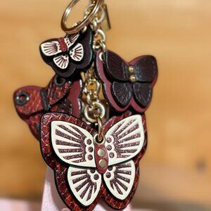 NWOT Coach Burgundy Butterfly Bag Charm